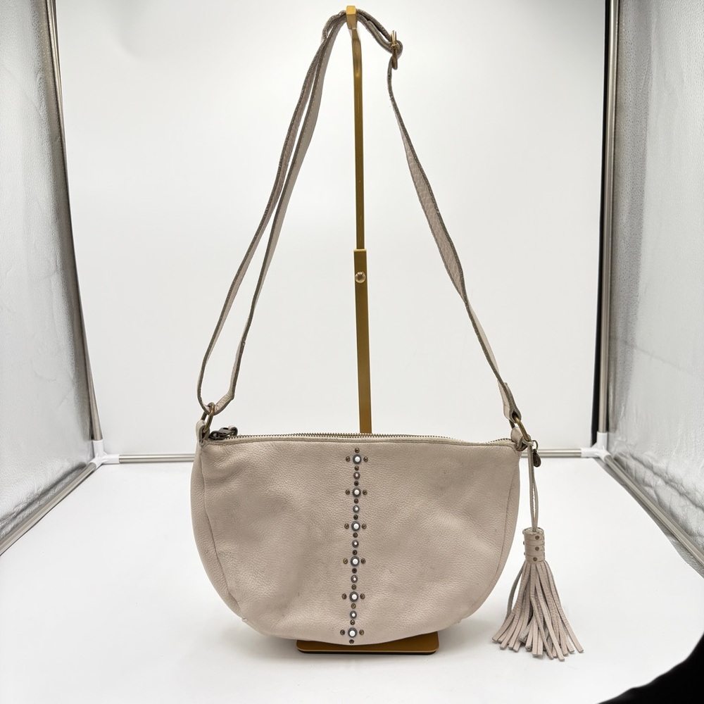 The Sak Boho Bohemian Crescent Crossbody Bag Purse Cream Leather Studded Tassel